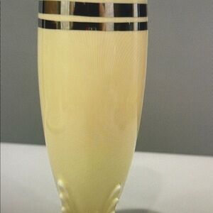 Elegant Cream Vase with Silver Accents